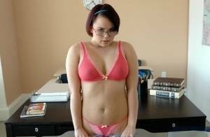 Enchanting coed in glasses Kaci Starr revealing puffy butt and tits on girlsfans.net