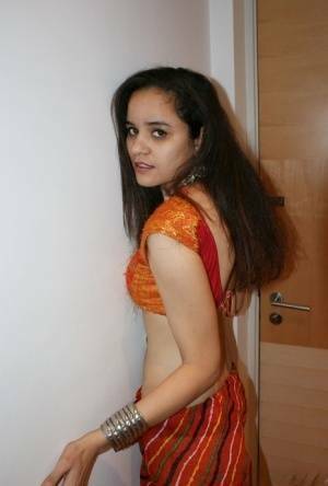 Indian princess Jasime takes her traditional clothes and poses nude - India on girlsfans.net