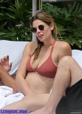  Ashley Greene Relaxing In A Bikini in Miami Beach on girlsfans.net