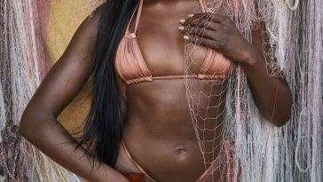 Duckie Thot Sexy 13 Sports Illustrated Swimsuit 2022 on girlsfans.net