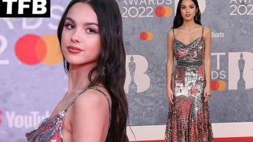 Olivia Rodrigo Cuts an Ethereal Figure in a Silver Dress at the BRIT Awards 2022 on girlsfans.net