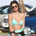 Selena Gomez Slutty Bikini On A Scooter Pics on girlsfans.net