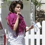 Selena Gomez Sucking And Showing Cameltoe on girlsfans.net