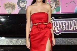 Selena Gomez Promotes Satanism In A Red Dress on girlsfans.net