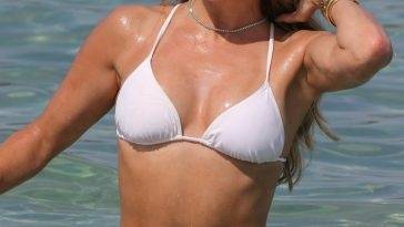 Sylvie Meis Looks Hot in a White Bikini on girlsfans.net