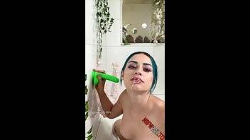 Jewelz Blu sucking a neon green dildo in the tub onlyfans porn videos on girlsfans.net