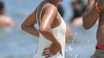 Karrueche Tran Looks Incredible in a White Swimsuit on the Beach in Miami on girlsfans.net