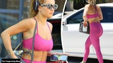 Rita Ora Looks Hot in Pink Activewear in Sydney on girlsfans.net