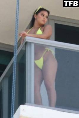 Aliana Mawla Puts on a Bikini Show on Her Hotel Balcony on girlsfans.net