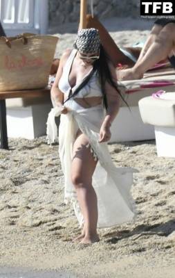 Alysha Behague Flaunts Her Curves on the Beaches of Mykonos Island on girlsfans.net