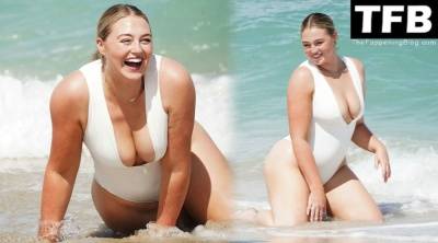 Iskra Lawrence Displays Her Curves on the Beach in Miami on girlsfans.net