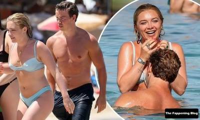 Florence Pugh & Will Poulter Enjoy a Flirty Beach Day in Ibiza on girlsfans.net