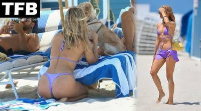 Kimberley Garner Has a Family Day on the Beach in Miami on girlsfans.net