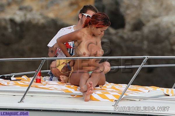  Rita Ora Tanning Topless On A Yacht on girlsfans.net