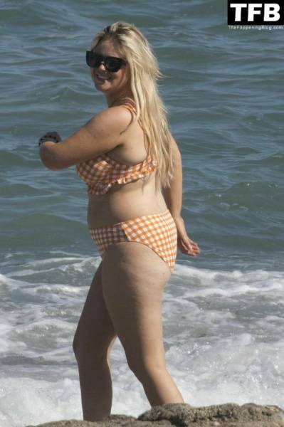 Emily Atack is Seen Having Fun by the Sea and Doing a Shoot on Holiday in Spain - Spain on girlsfans.net