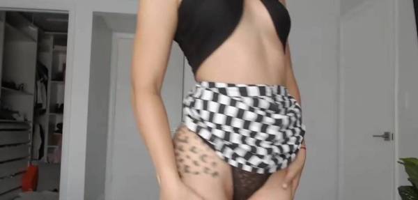 Beautiful curly bitch Xoleelee in a skirt posing for the camera on girlsfans.net